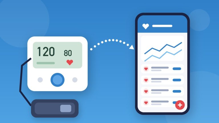 Aparelho de pressão ao lado do celular com app que registra as medições